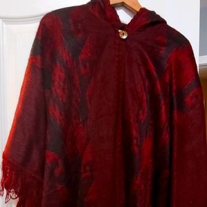 Never worn Poncho with Hood.